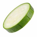 a green zucchini slice, smooth texture, angled, floating, isolated Royalty Free Stock Photo
