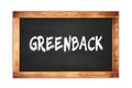 GREENBACK text written on wooden frame school blackboard