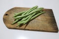 Greenbeans on the wooden board