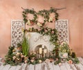 Greenery decorations with peach, pink, flowers and fireplace, romantic mood