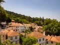 Greenery embracing rooftops in the montains surrounded by woods. In Sintra, Portugal