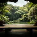 Greenery graces backdrop of wooden platform, a tranquil oasis in view