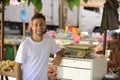 A greengrocer at the cashier Royalty Free Stock Photo