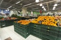 Greengrocer store. Oranges in the foreground