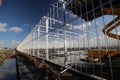 Greenhouse construction in progress in Moerkapelle where a rose nursery is builded.