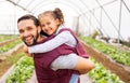 Greenhouse farmer, dad with girl and happy smile of girl getting piggyback ride from father in an organic farm for