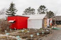 Greenhouse with outdoor small garden near Shiraoi Ainu Village Museum in Hokkaido, Japan Royalty Free Stock Photo