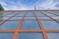 Greenhouse roof with painted brown beams and fiber glass roof in Tucson, Arizona