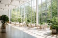 Greenhouse or winter garden with large windows and natural sunlight, for hosting large events such as a banquet, wedding