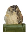 Greenish-gray Jasper mineral on the bar of ofiokaltsit isolated