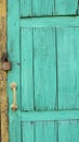 Vertical image of a rustic door with a padlock Royalty Free Stock Photo