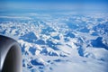 GREENLAND - 10 MAY 2018: View from the aircraft window of the engine of a Boeing 787 over the icebergs of Greenland Royalty Free Stock Photo