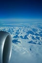GREENLAND - 10 MAY 2018: View from the aircraft window of the engine of a Boeing 787 over the icebergs of Greenland Royalty Free Stock Photo
