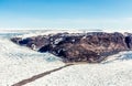 Greenlandic melting ice sheet glacier aerial view from the plane, near Kangerlussuaq, Greenland