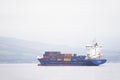 Greenock , Inverclyde / Scotland - July 12th 2019: Cargo ship vessel freight transport of containers on sea