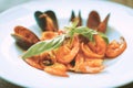 Tasty-looking Italian pasta with shrimps and oysters with shells