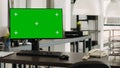 Greenscreen desktop in coworking space Royalty Free Stock Photo