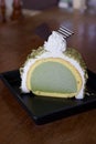 Greentea icecream cake on wood table Royalty Free Stock Photo