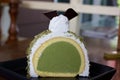 Greentea icecream cake on wood table Royalty Free Stock Photo