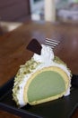 Greentea icecream cake on wood table Royalty Free Stock Photo