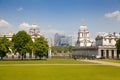 Greenwich Royal navy office, classic colonnade and Canary Wharf business district on the background