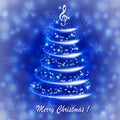 Greeting card with an abstract musical Christmas tree, with notes and treble clef Royalty Free Stock Photo