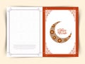 Greeting card with Arabic text and moon for Eid celebration. Royalty Free Stock Photo