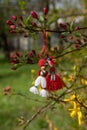 Greeting card background for the arrival of spring. Red-white man and woman figures martenitsa - Bulgarian spring symbol