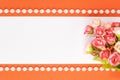 Greeting card bouquet of small roses with a white note, orange background. St. Valentine`s Day Royalty Free Stock Photo