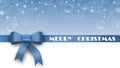 Greeting card with christmas decorations in blue design - MERRY CHRISTMAS lettering on ribbon with bow - free place for your text Royalty Free Stock Photo