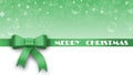 Greeting card with christmas decorations in green design - MERRY CHRISTMAS lettering on ribbon with bow - free place for your text Royalty Free Stock Photo