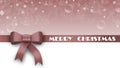 Greeting card with christmas decorations in pink design - MERRY CHRISTMAS lettering on ribbon with bow - free place for your text Royalty Free Stock Photo