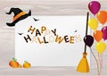 Greeting card for Halloween. Creative frame with a pumpkin broom