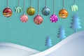 Greeting card of hanging christmast ball and pine on snow hill Royalty Free Stock Photo