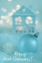 Greeting card Happy Merry Christmas. Blue Ball and Beautiful blurred background of winter decoration for the holiday. Soft focus Royalty Free Stock Photo