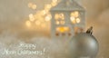 Greeting card Happy New Year. Ball and Beautiful blurred blue background of winter decoration for the holiday. Soft focus Royalty Free Stock Photo