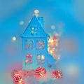 Greeting card Happy New Year and Merry Christmas. Cottage or chalet,  background of winter decoration for the holiday. Copy space. Royalty Free Stock Photo
