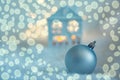 Greeting card Happy New Year and Merry Christmas. Snowflakes. Blue house, a ball of a pine on the snow in Christmas. Soft focus Royalty Free Stock Photo