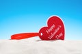 Greeting card happy Valentine day heart shape on sand Royalty Free Stock Photo