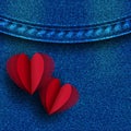 Greeting card with hearts on denim background.