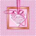 Greeting card with a lace heart on a satin ribbon