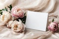 Greeting card mockup and beautiful beige peony flowers