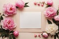 Greeting card mockup and beautiful pink peonies flowers frame on pastel beige background with copy space.