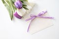 greeting card mockup. bouquet of purple tulips isolated on a white background. space for text. Royalty Free Stock Photo