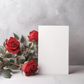 Greeting card mockup decorated with beautiful red roses. Royalty Free Stock Photo