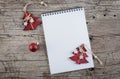 Greeting card mockup template with Christmas decorations on wooden background. Top view, copy space Royalty Free Stock Photo