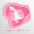 Greeting card for mother`s day with congratulation text. Cut paper shape with mother and baby stylized silhouettes on pink backdro