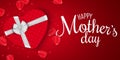 Greeting card for Mothers Day. Red gift box of heart with bow. Red background. Rose petals and confetti. I love mommy. Calligraphy