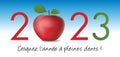 Greeting card 2023 with the concept of red apple symbol of temptation where of well-being.