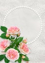 Greeting card with a pearl frame with space for text or photo, pink roses on a vintage lace background Royalty Free Stock Photo